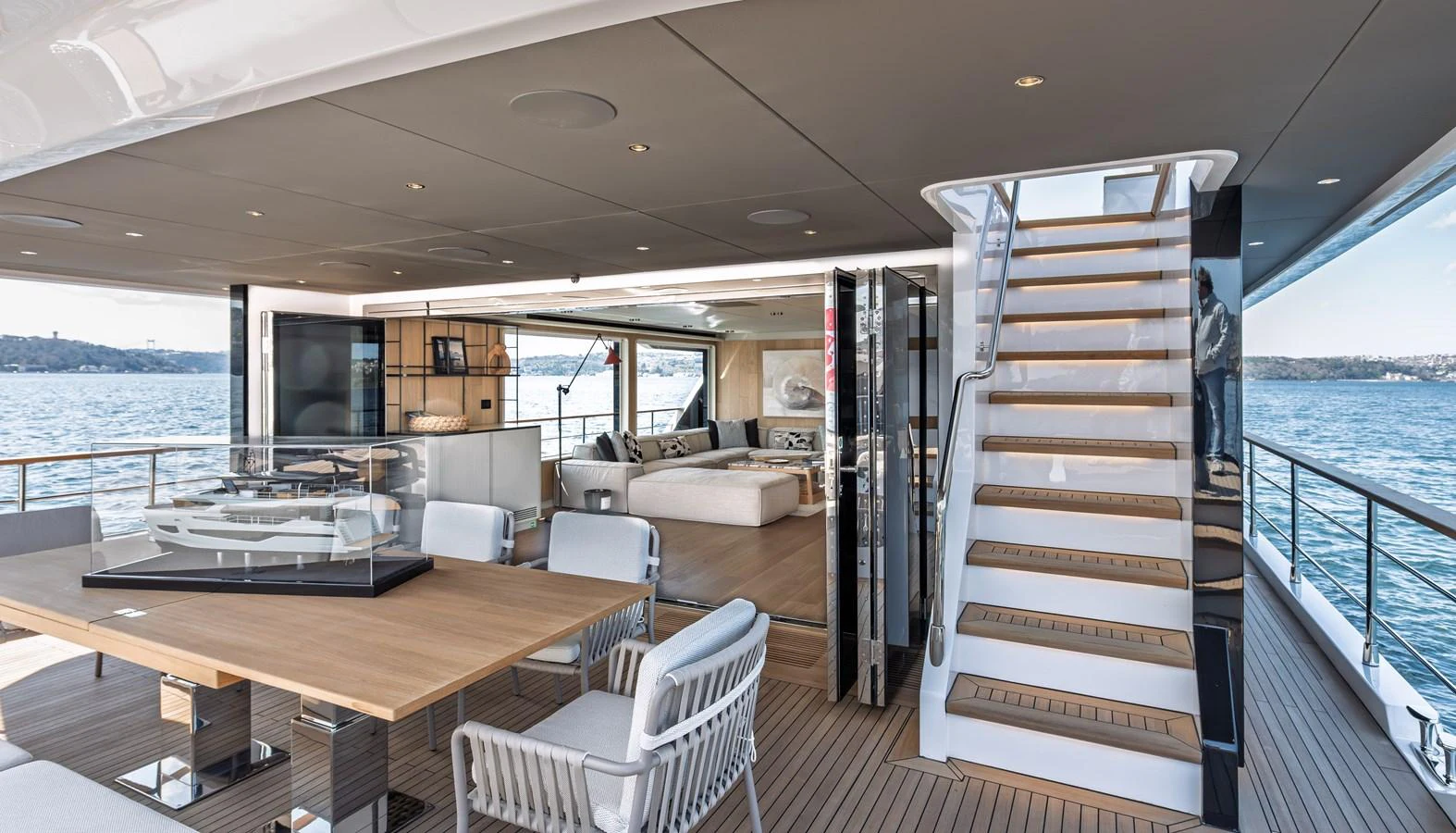 The aft deck offers a spacious and elegant area for relaxation and dining with a seamless transition to the interior living space. aboard NUMARINE 30XP#3 Yacht for Sale