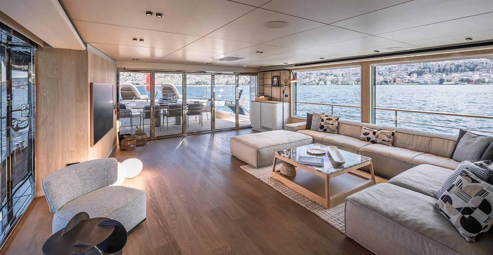 The spacious salon offers panoramic views and luxurious seating arrangements. aboard NUMARINE 30XP#3 Yacht for Sale