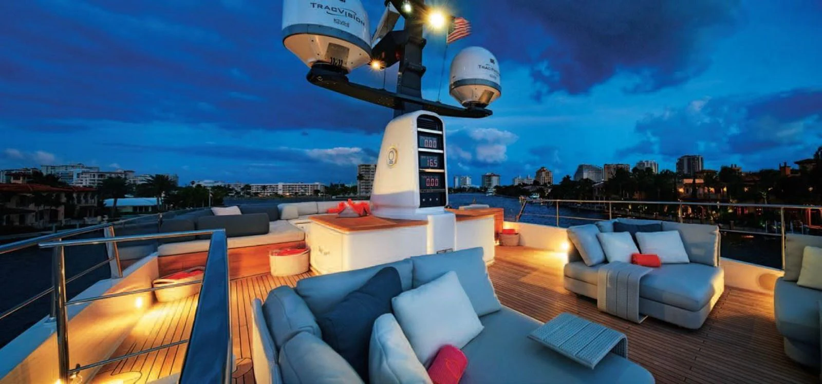 The sundeck offers a luxurious lounging area with plush seating and ambient lighting, perfect for evening relaxation. aboard O Yacht for Sale