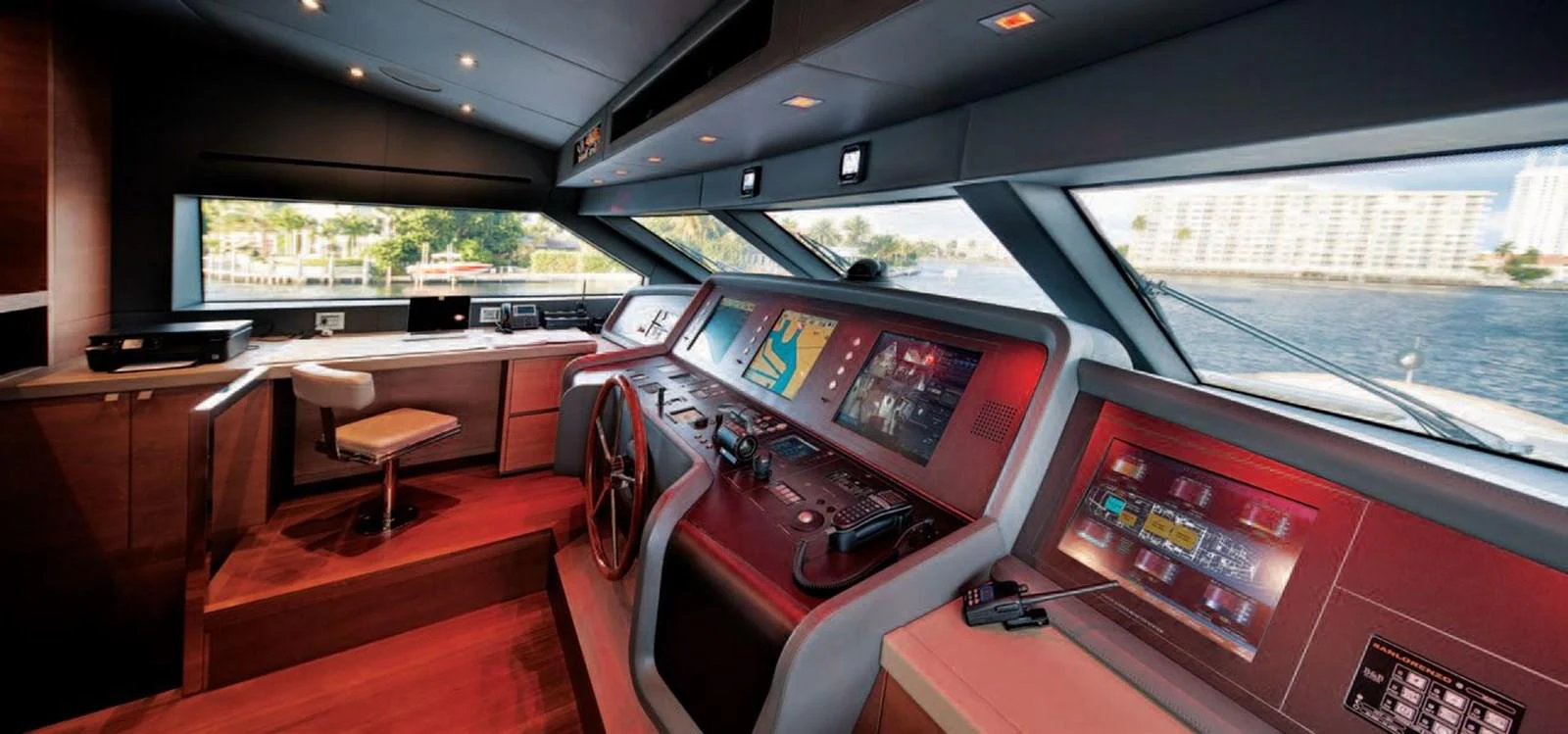 The helm station features advanced navigation equipment and a panoramic view. aboard O Yacht for Sale