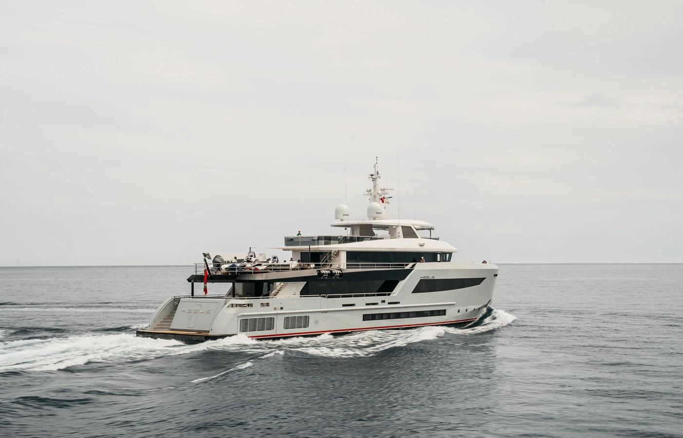 A sleek and modern yacht cruising gracefully on open waters. aboard BERING 145 Yacht for Sale