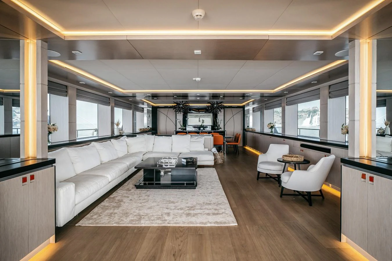 The spacious salon features modern furnishings and ample natural light. aboard BERING 145 Yacht for Sale