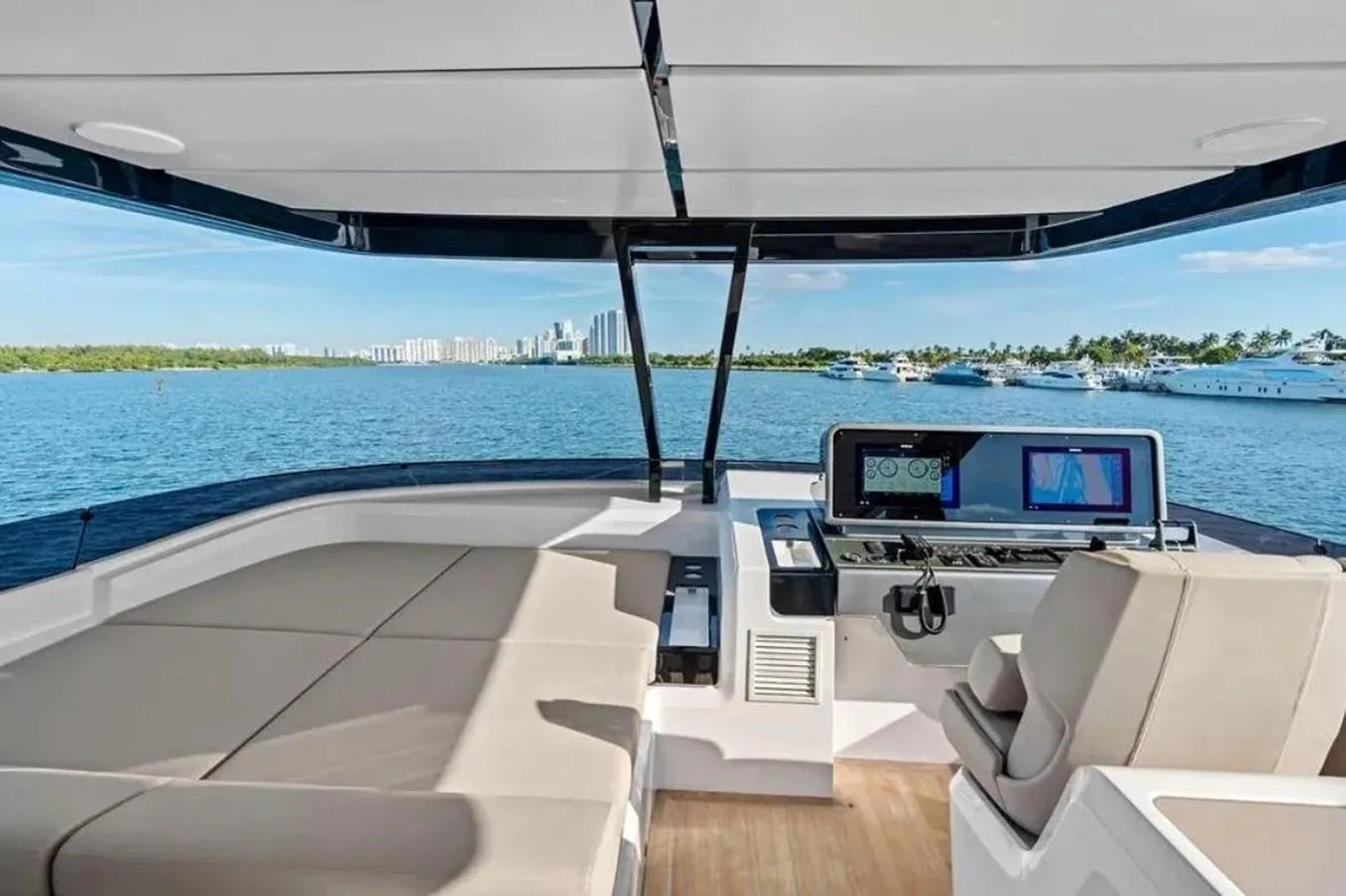 The helm area offers a spacious and modern command center with panoramic views of the water. aboard SAVIENNE Yacht for Sale