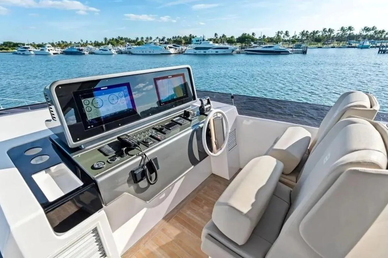 The helm station offers a modern and sophisticated control area with plush seating and state-of-the-art navigation equipment. aboard SAVIENNE Yacht for Sale
