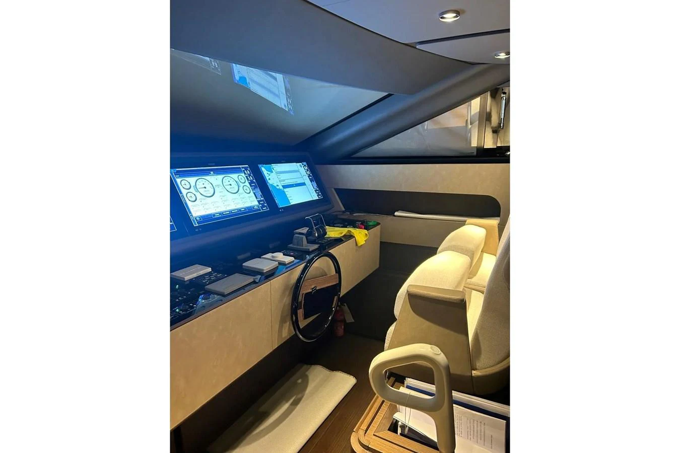 The helm station features advanced navigation equipment and luxurious seating. aboard SAVIENNE Yacht for Sale