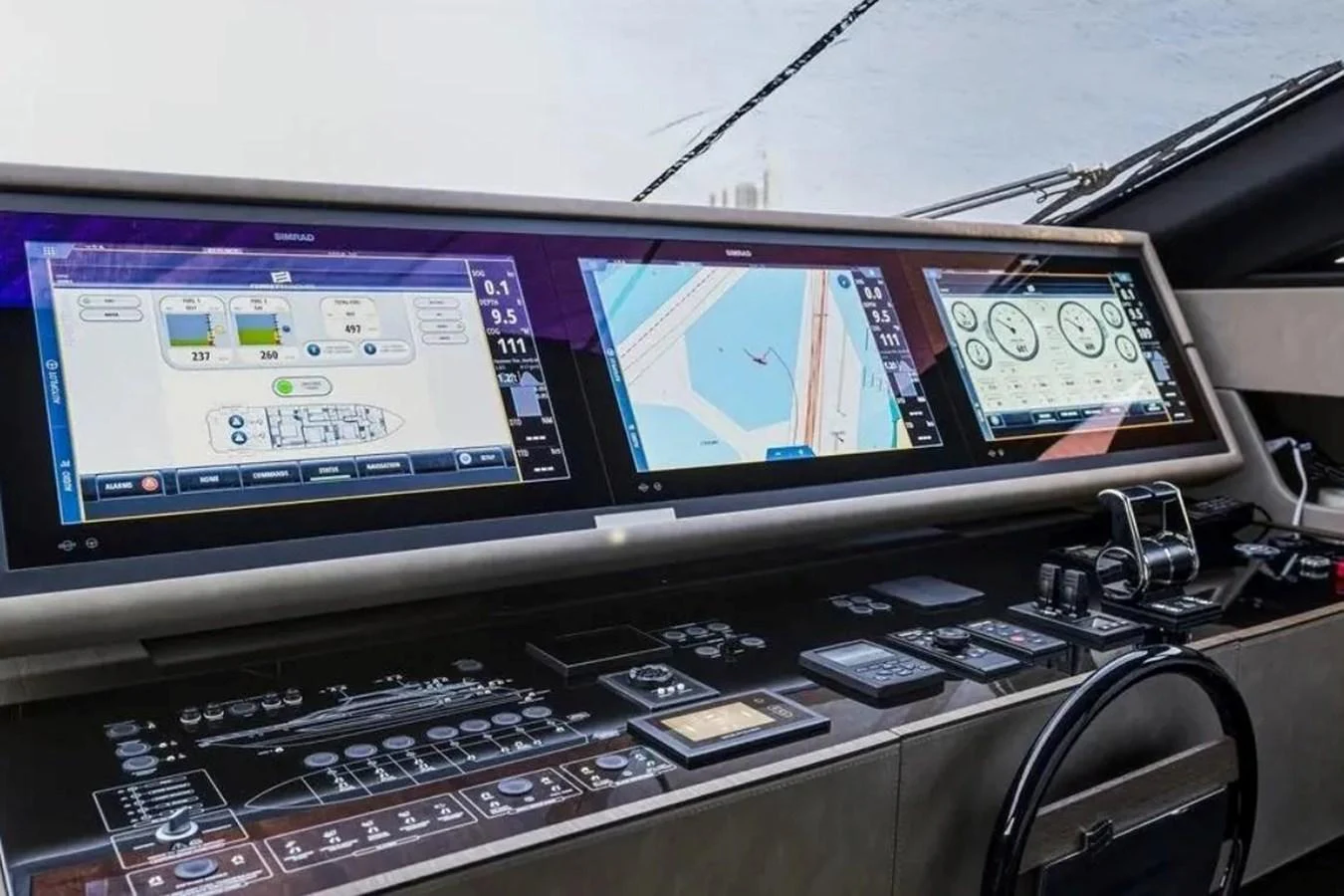 The helm station features advanced navigation and control systems with multiple displays and controls. aboard SAVIENNE Yacht for Sale