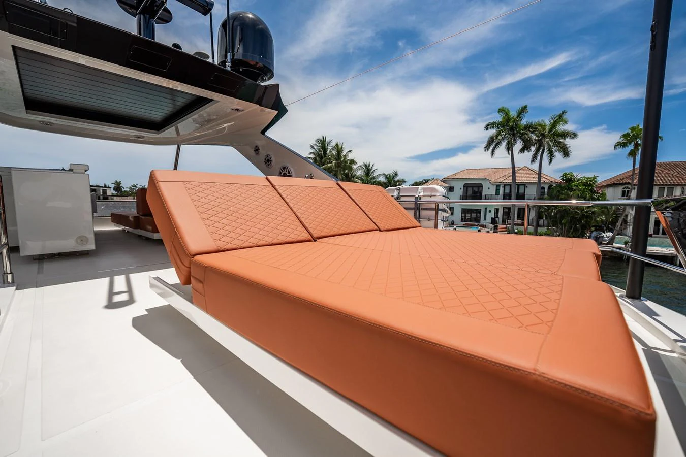 The sundeck features luxurious sun loungers with a stunning view of the surroundings. aboard ELENA Yacht for Sale