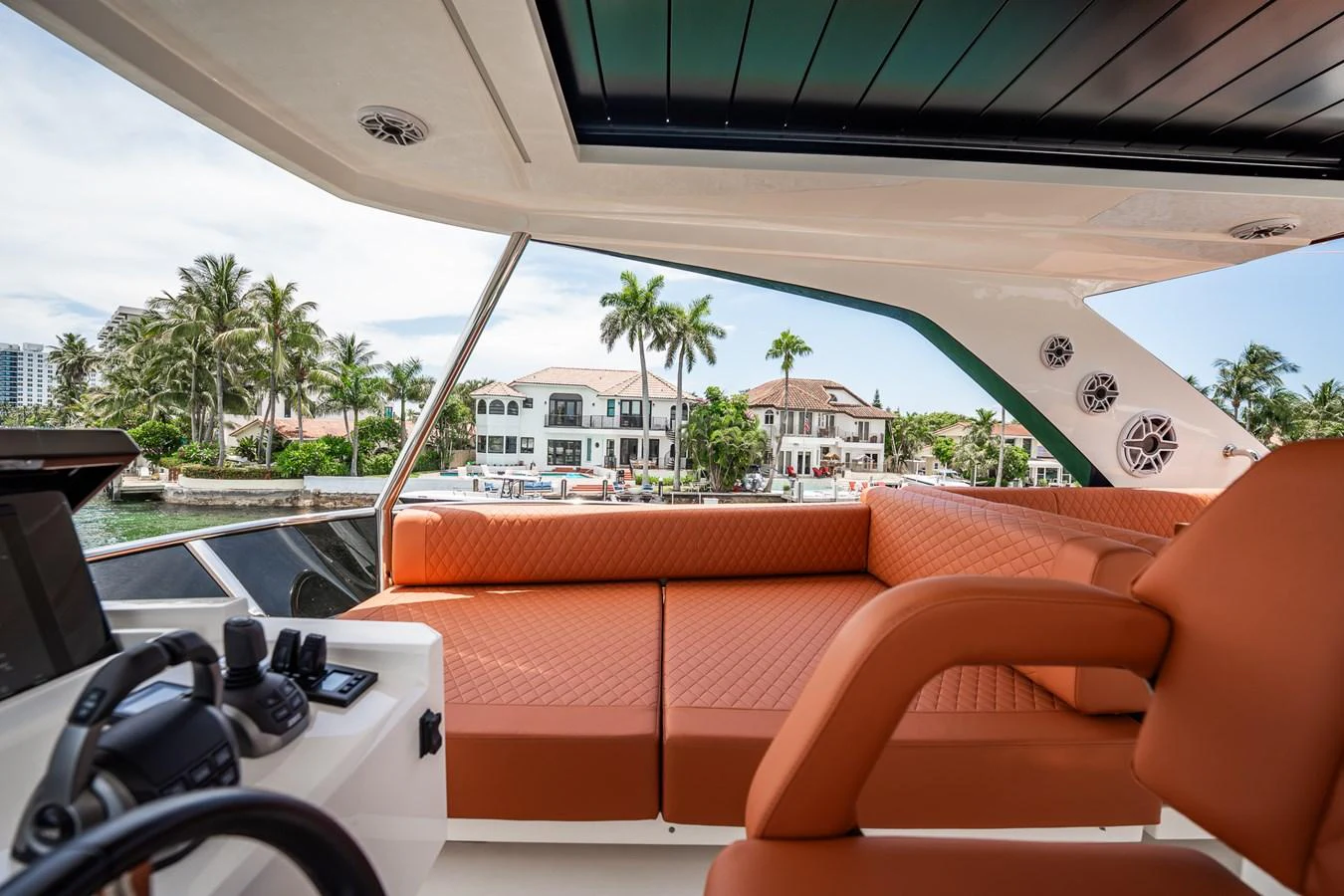 The helm area features luxurious seating with a view of the waterfront. aboard ELENA Yacht for Sale
