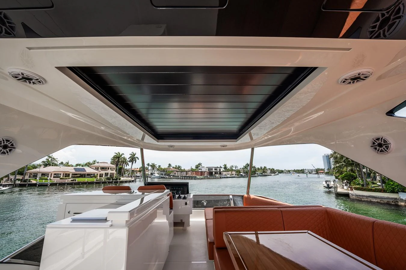 The flybridge offers a spacious and luxurious area with comfortable seating and a stunning view of the water. aboard ELENA Yacht for Sale