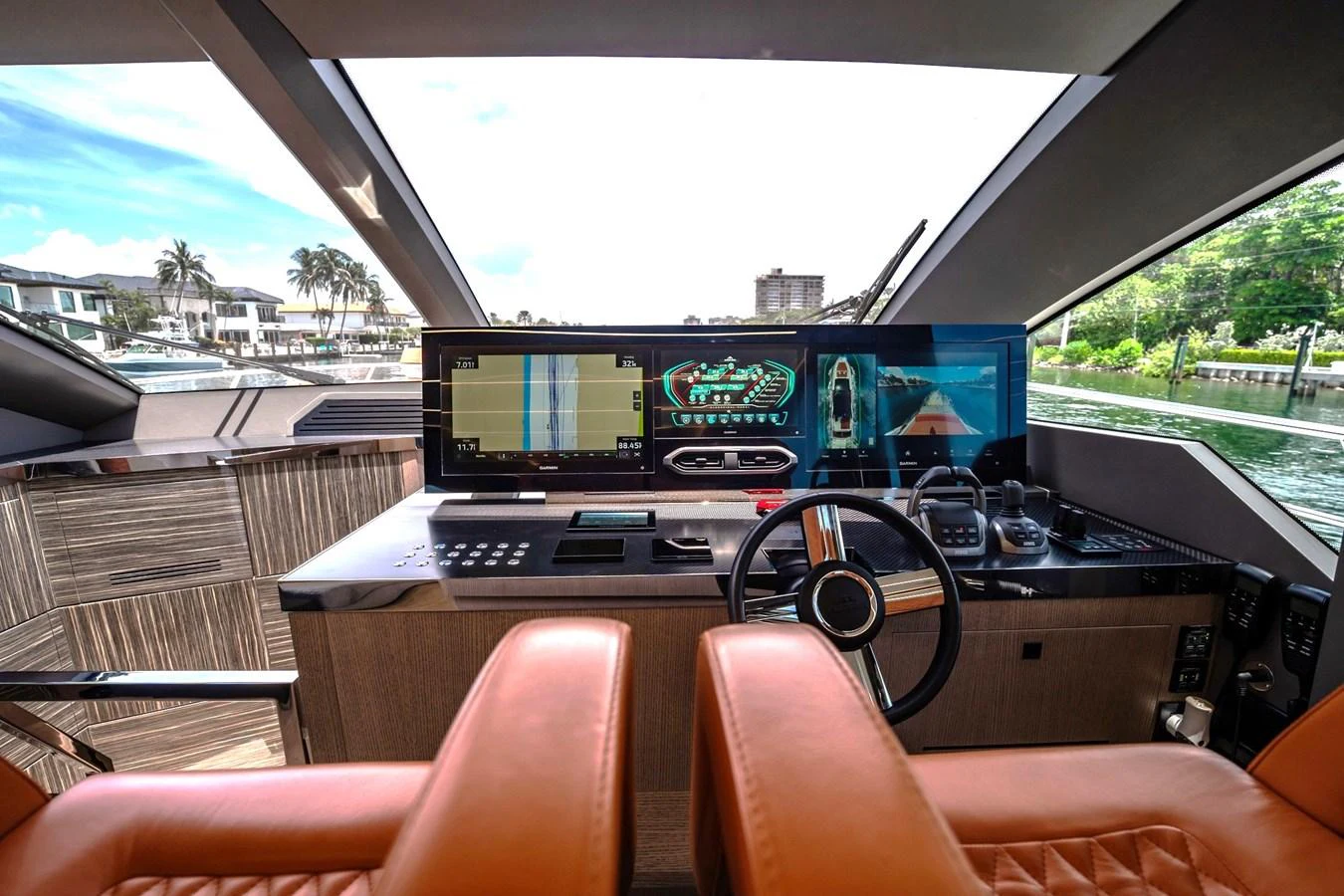 The helm station features state-of-the-art navigation equipment and luxurious leather seating. aboard ELENA Yacht for Sale