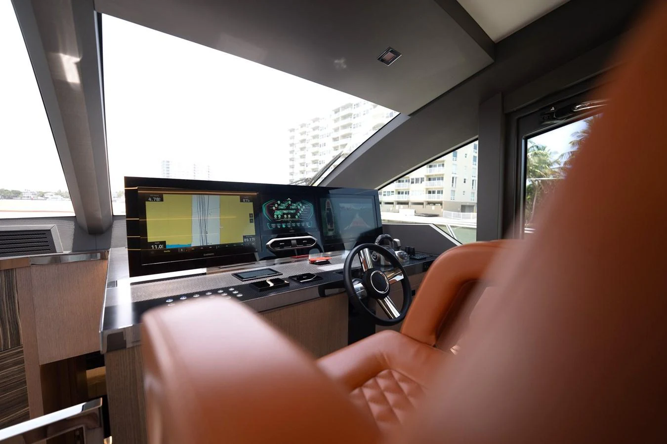 The helm station features state-of-the-art navigation equipment and luxurious seating. aboard ELENA Yacht for Sale