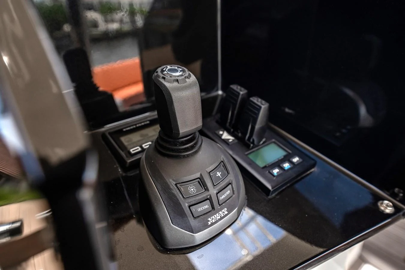 A close-up view of the yacht's helm controls showcasing advanced navigation technology. aboard ELENA Yacht for Sale