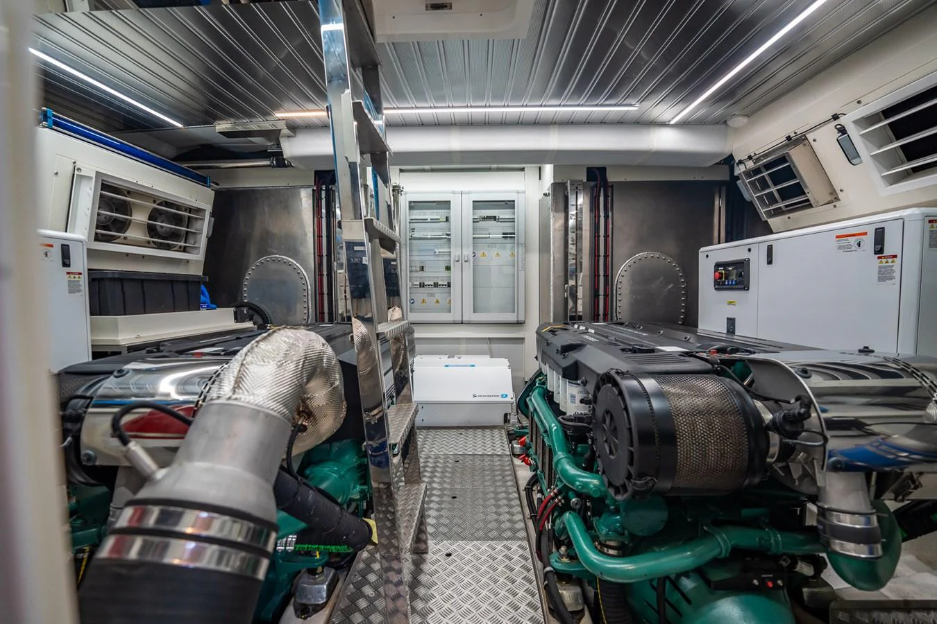 The engine room showcases powerful machinery and a clean, organized layout. aboard ELENA Yacht for Sale