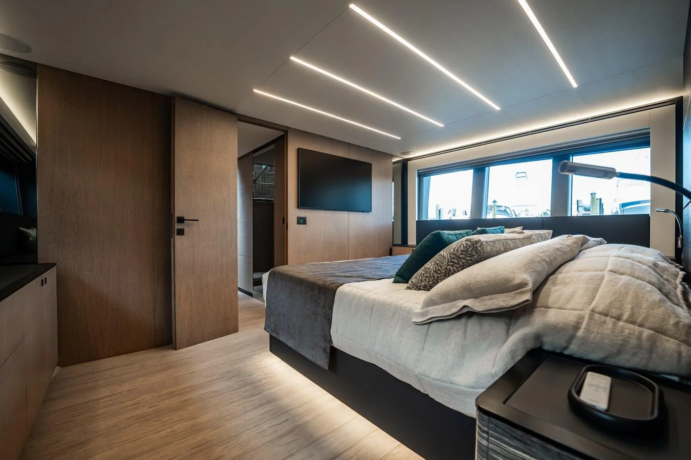 A luxurious stateroom featuring modern design and ample natural light. aboard ELENA Yacht for Sale
