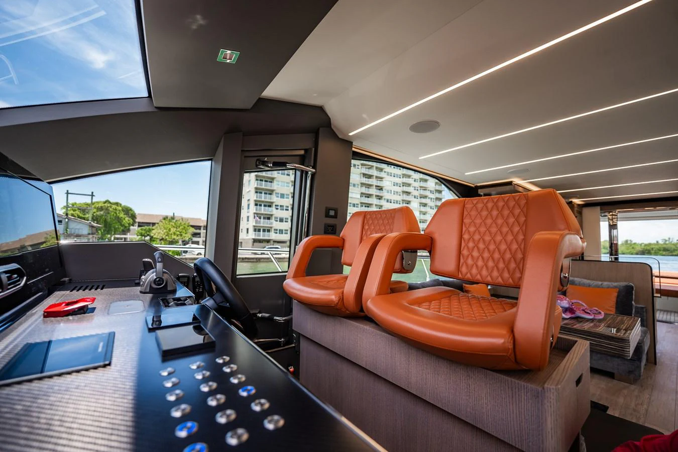 The helm station features luxurious seating and state-of-the-art navigation equipment. aboard ELENA Yacht for Sale