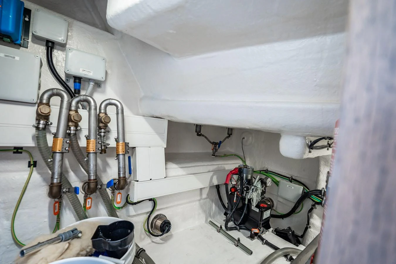 The image showcases the yacht's well-organized engine room with various mechanical components and systems. aboard ELENA Yacht for Sale