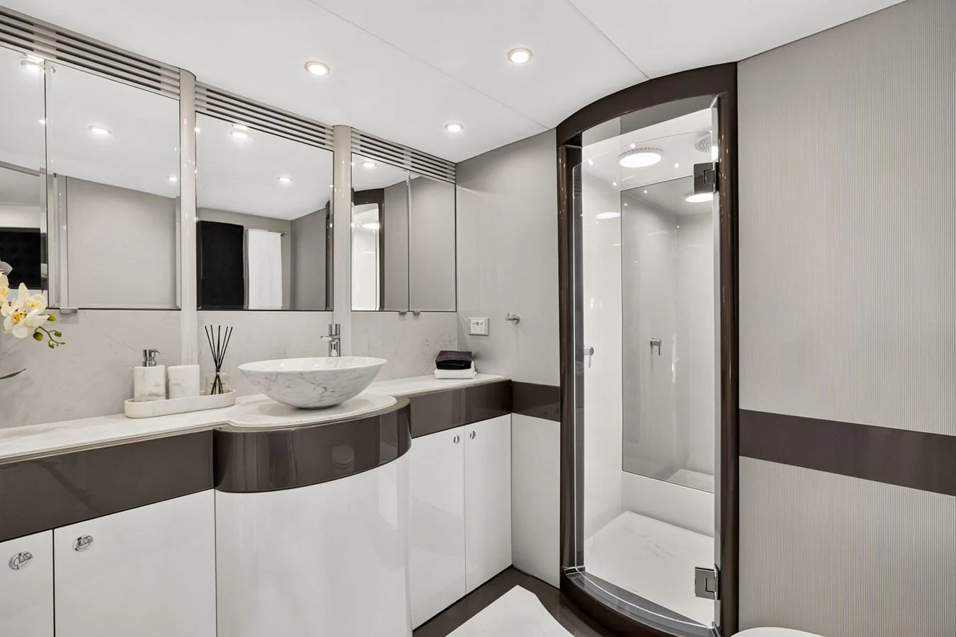 The yacht's bathroom features modern fixtures and a sleek design. aboard WARREN 87 Yacht for Sale