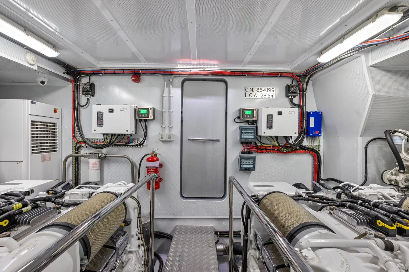 The engine room showcases the yacht's powerful and well-maintained machinery. aboard WARREN 87 Yacht for Sale