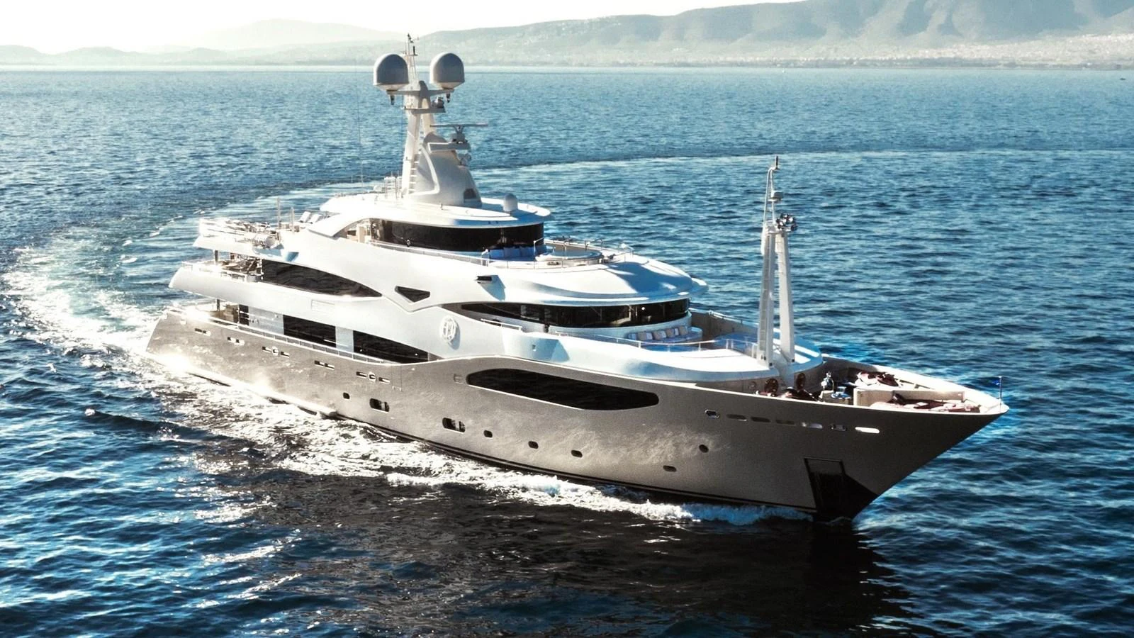 A majestic yacht glides gracefully through the serene blue waters, showcasing its sleek design and luxurious features. aboard ELENI 60M Yacht for Sale