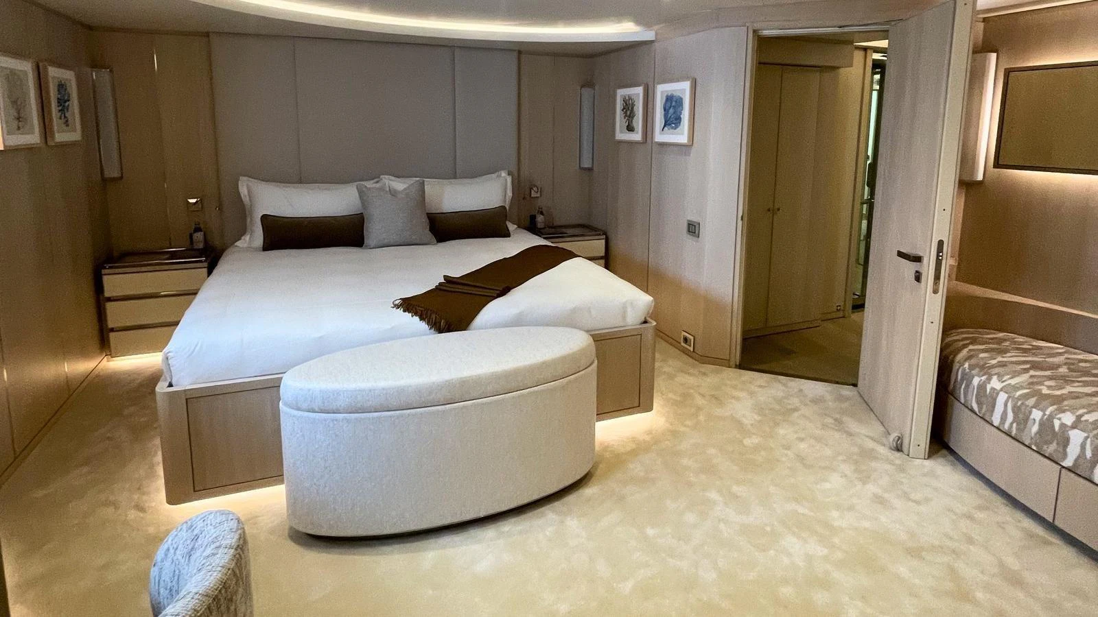 The master stateroom features a spacious bed, elegant decor, and ample natural light. aboard ELENI 60M Yacht for Sale