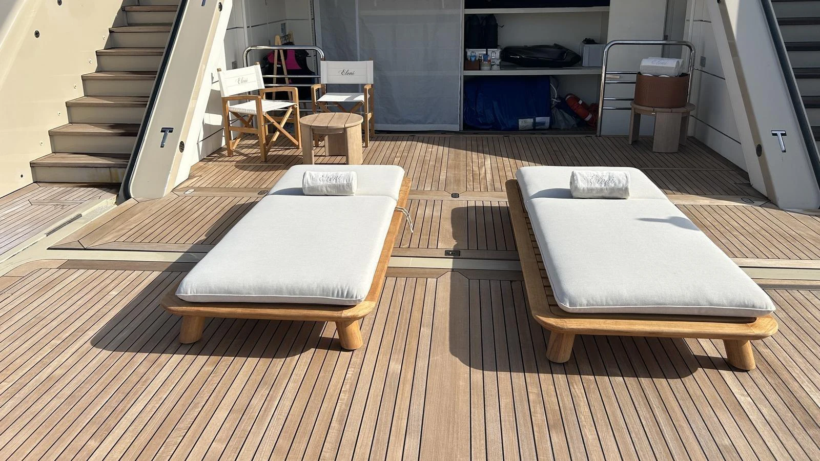 The sundeck features comfortable lounge chairs and a cozy seating area for relaxation. aboard ELENI 60M Yacht for Sale