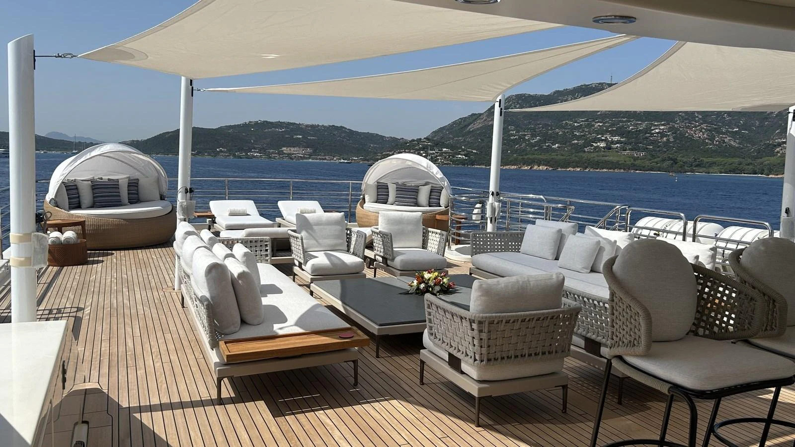 The sundeck offers luxurious lounging areas with comfortable seating and stunning views. aboard ELENI 60M Yacht for Sale