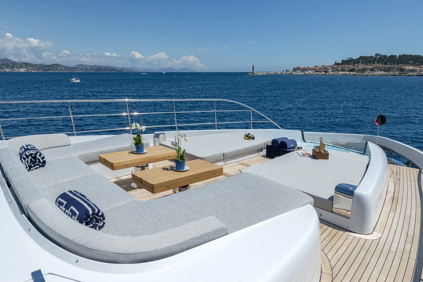 The sundeck offers a luxurious lounging area with panoramic ocean views. aboard AMER 120/11 Yacht for Sale