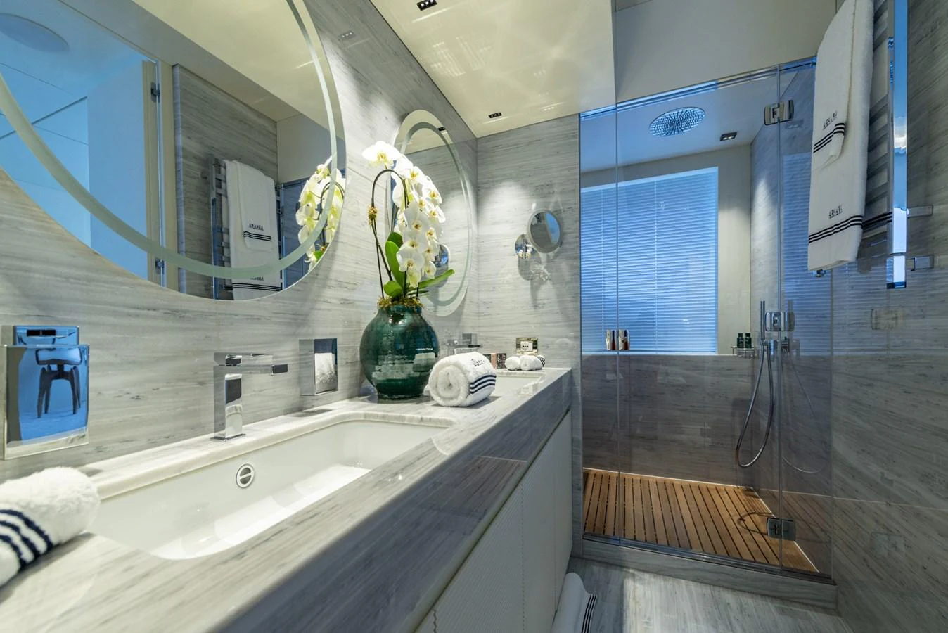 A luxurious yacht bathroom featuring modern fixtures and elegant decor. aboard AMER 120/11 Yacht for Sale