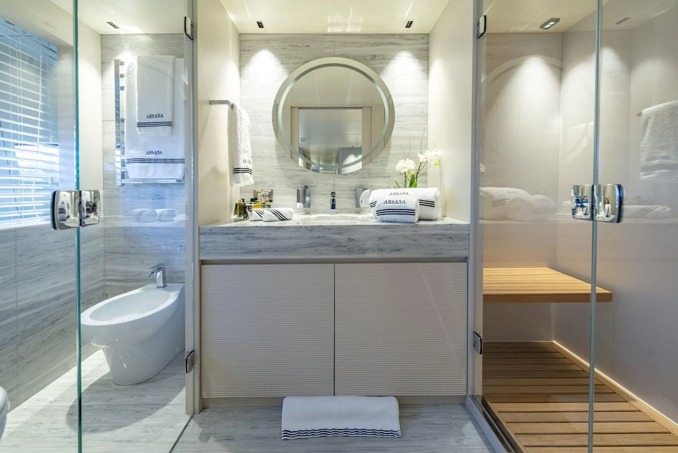 The yacht's bathroom features a sleek and modern design with luxurious amenities. aboard AMER 120/11 Yacht for Sale