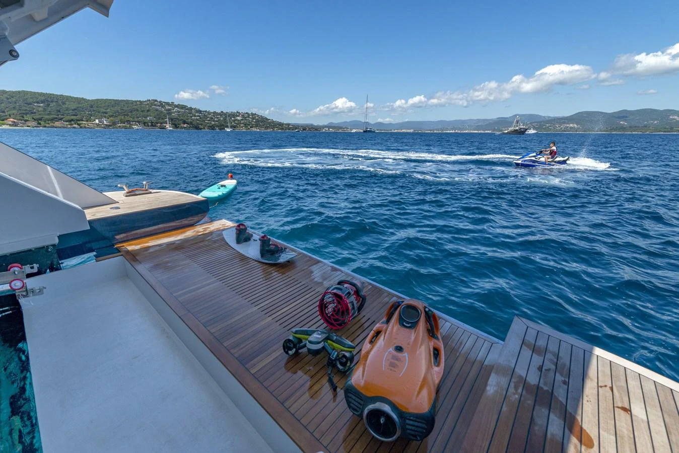 The yacht's swim platform is equipped with water toys, offering a fun and adventurous experience on the water. aboard AMER 120/11 Yacht for Sale