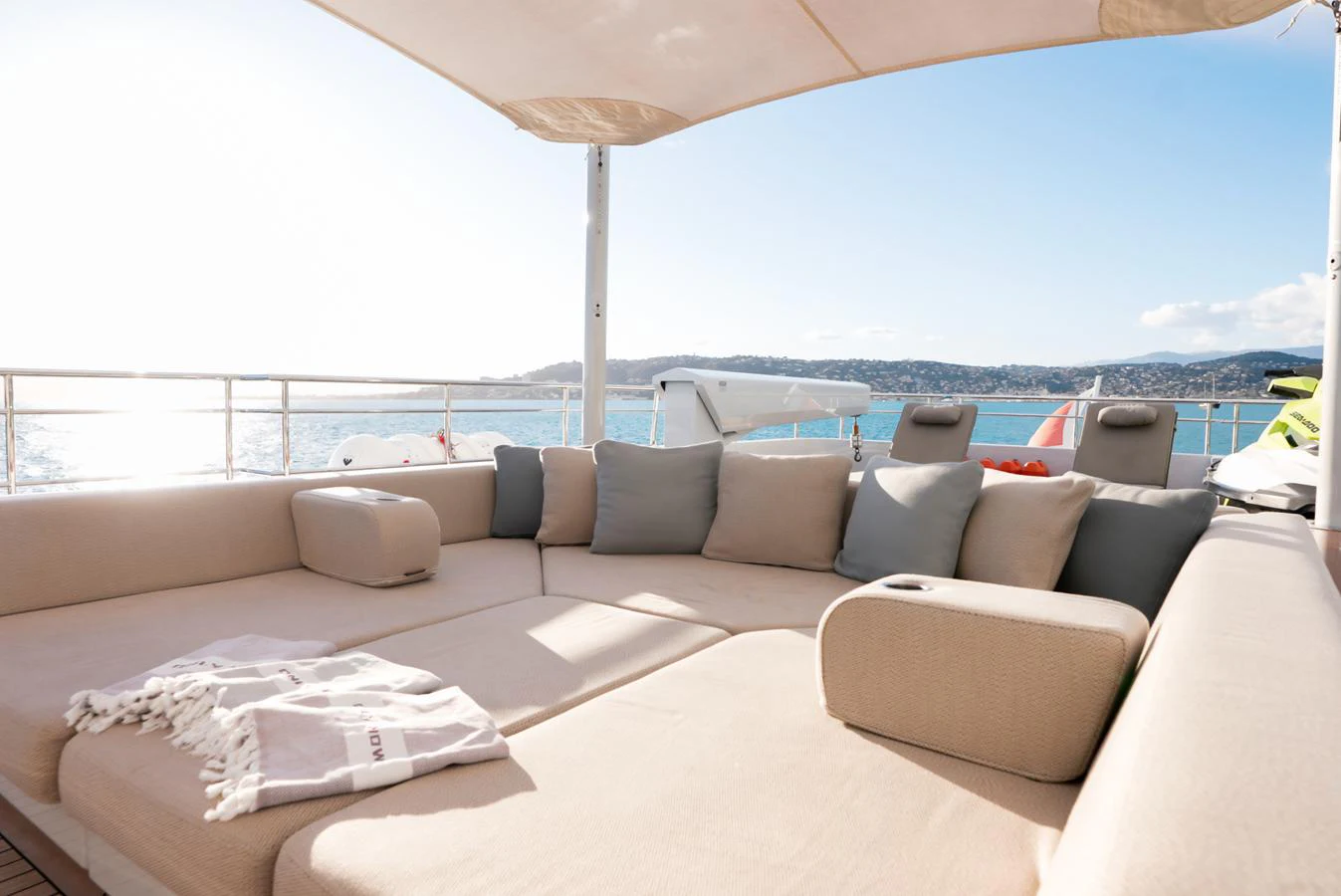 The sundeck offers a spacious and comfortable lounging area with stunning ocean views. aboard ONLY NOW Yacht for Sale