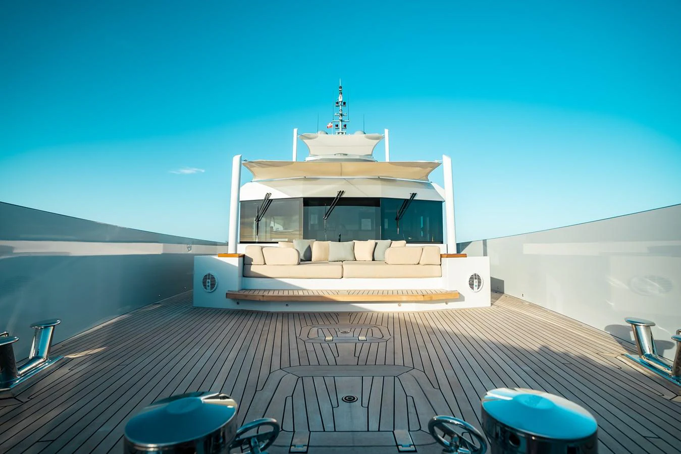 The foredeck features a spacious seating area with plush cushions, perfect for relaxation under the sun. aboard ONLY NOW Yacht for Sale