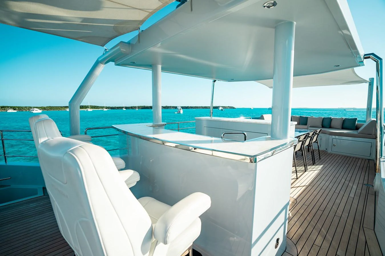 The flybridge offers a luxurious outdoor space with comfortable seating and a bar area, perfect for enjoying the sea views. aboard ONLY NOW Yacht for Sale