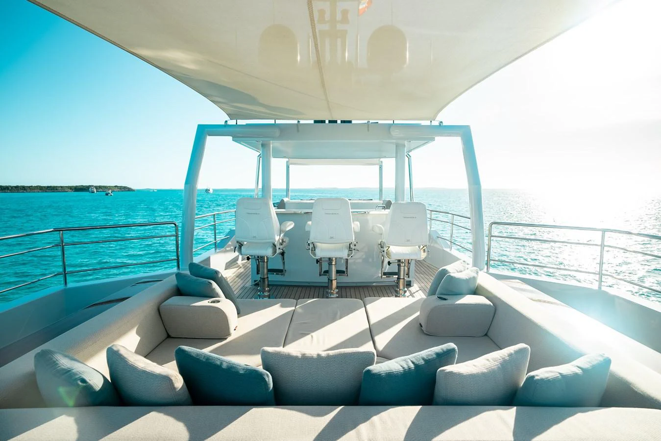 The flybridge offers a spacious and luxurious seating area with stunning ocean views. aboard ONLY NOW Yacht for Sale