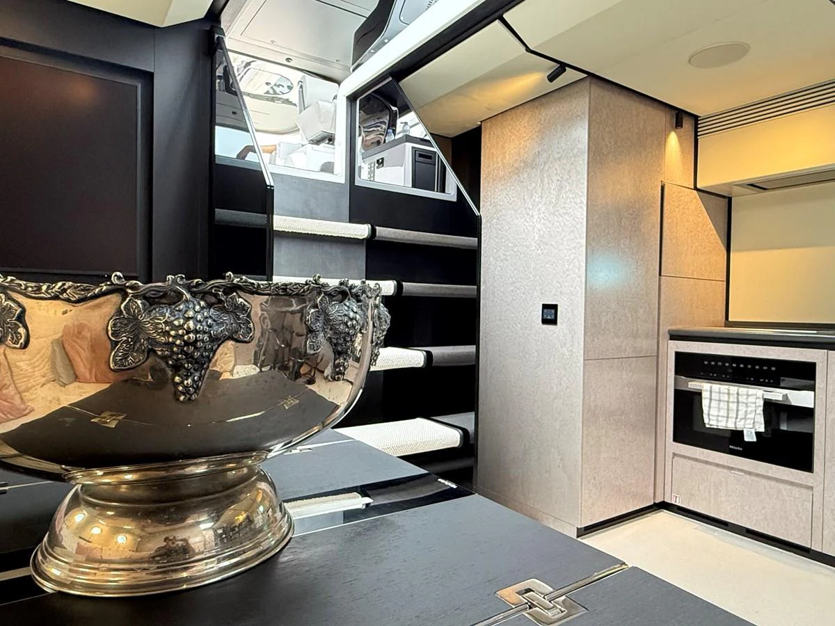 A luxurious interior space featuring a modern kitchen and elegant decor. aboard DUTCH PEARL Yacht for Sale