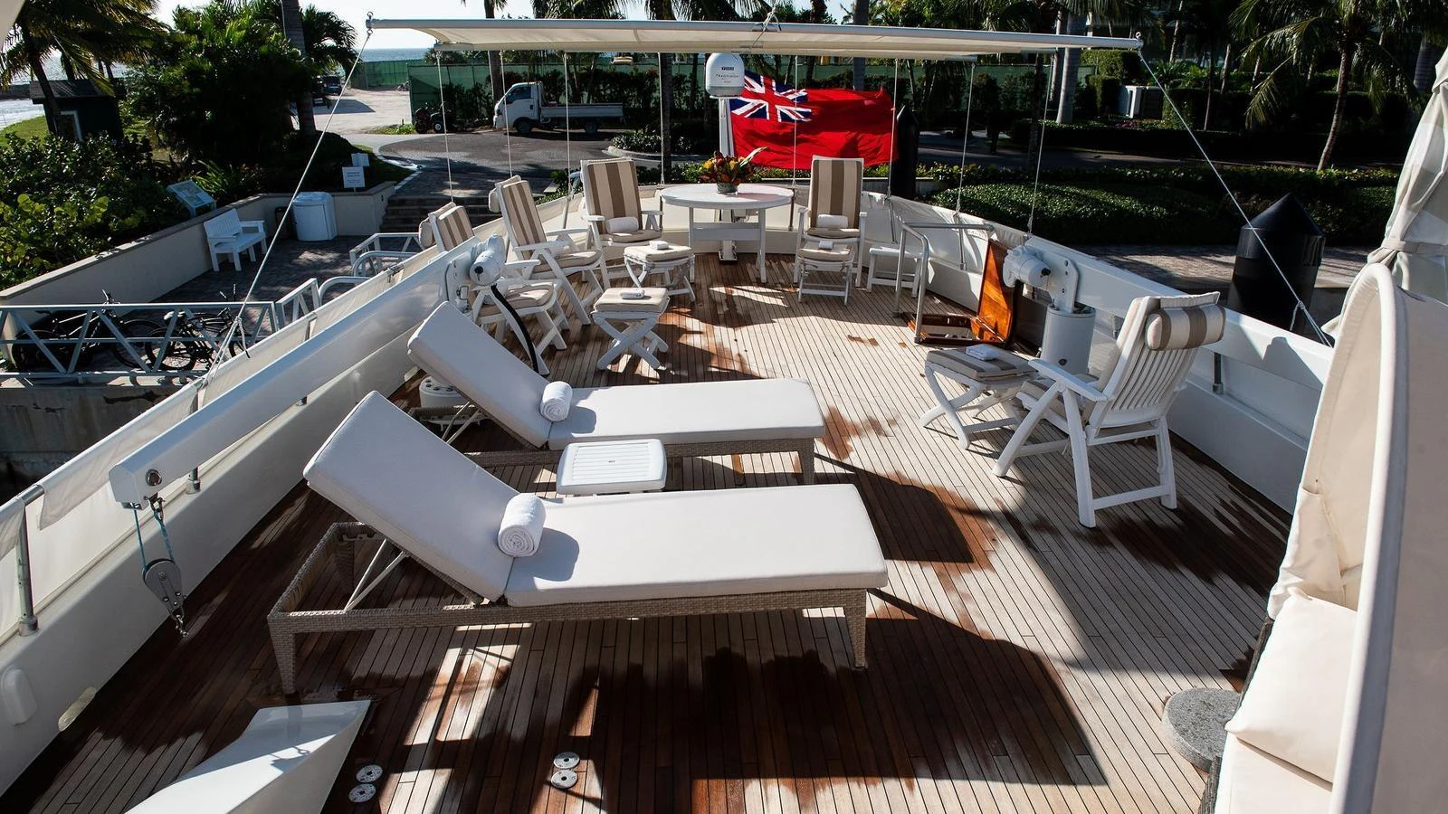 The sundeck offers a spacious area with comfortable lounge chairs and seating for relaxation. aboard SISISI Yacht for Sale
