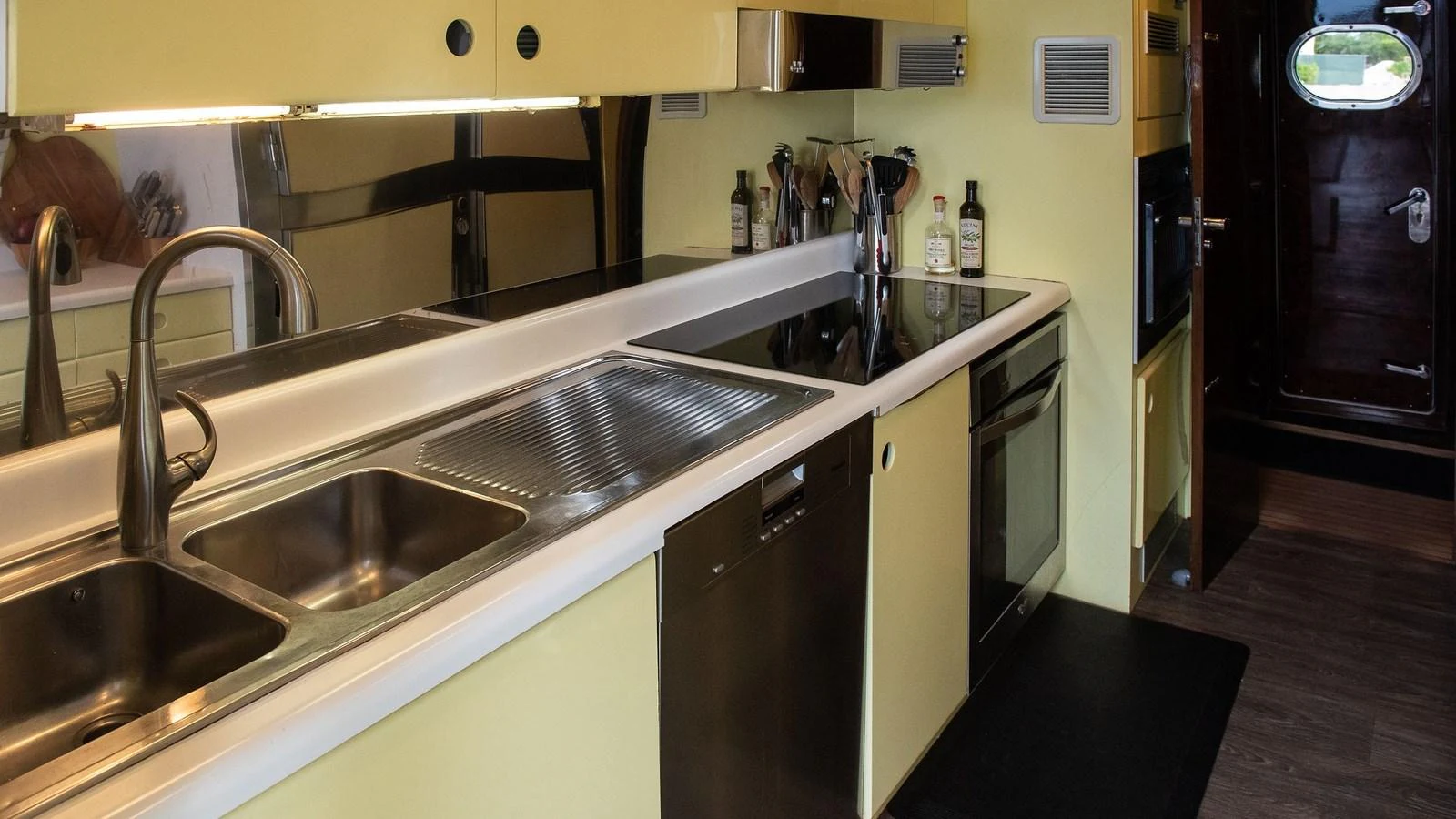 The galley features modern appliances and ample counter space for culinary preparations. aboard SISISI Yacht for Sale