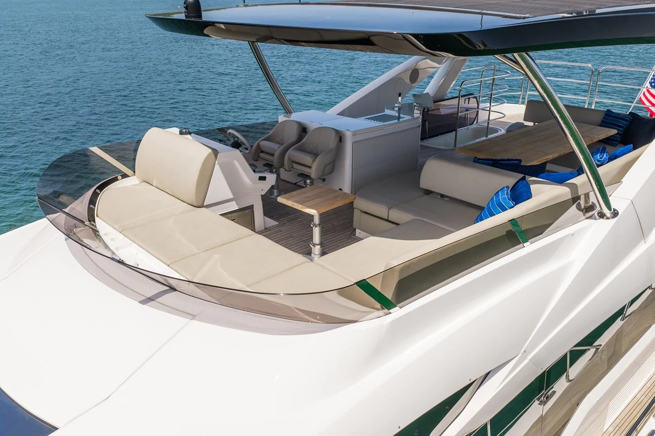 The flybridge offers a spacious and luxurious area for relaxation and navigation. aboard BAZINGA Yacht for Sale