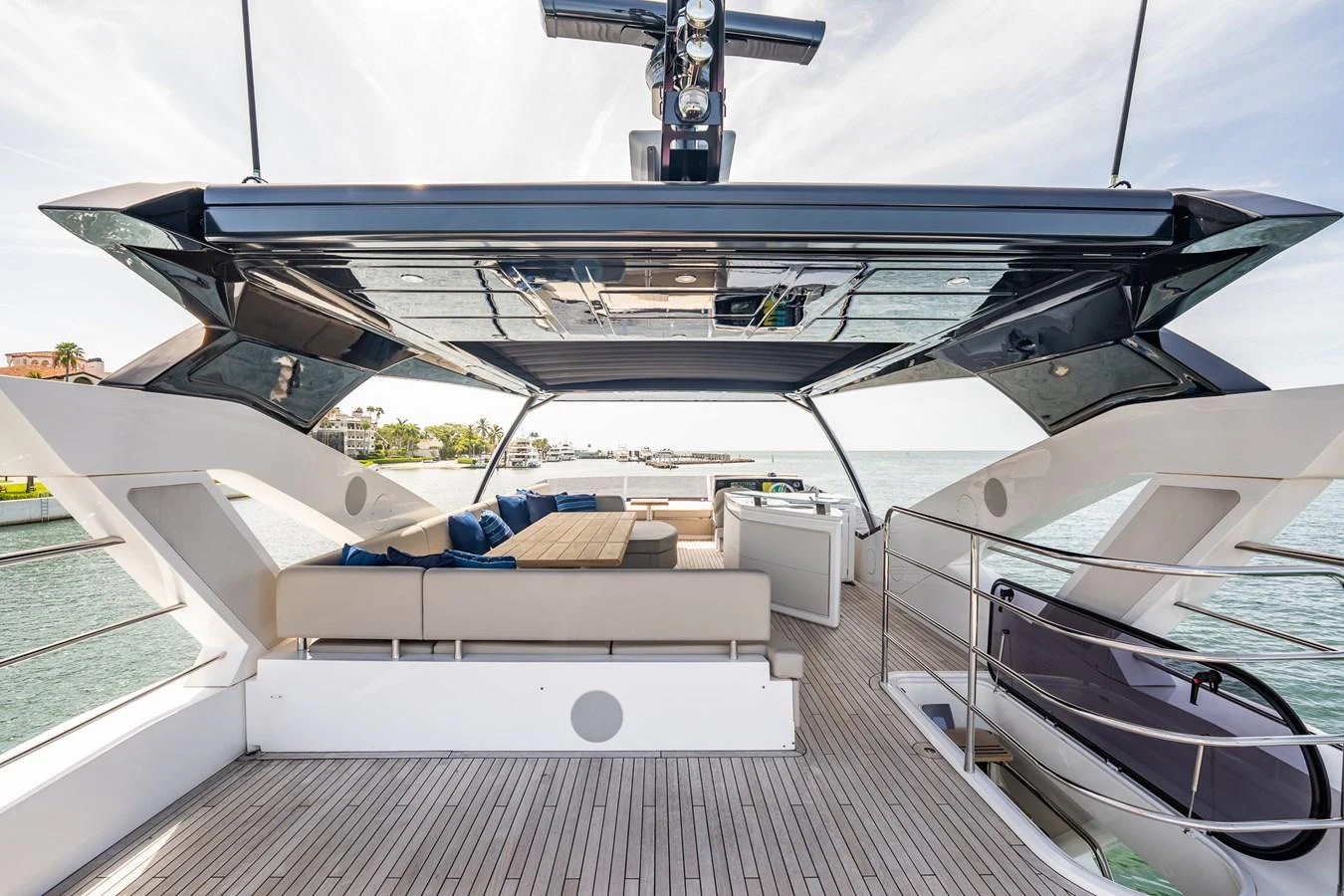 The yacht's aft deck offers a spacious and stylish area for relaxation and socializing with panoramic views of the water. aboard BAZINGA Yacht for Sale