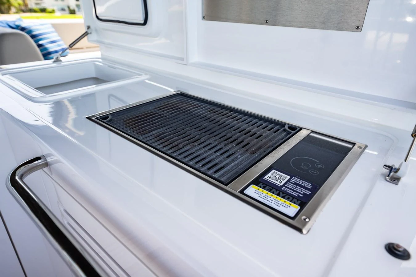 A sleek built-in grill on the yacht's deck offers convenient outdoor cooking. aboard BAZINGA Yacht for Sale