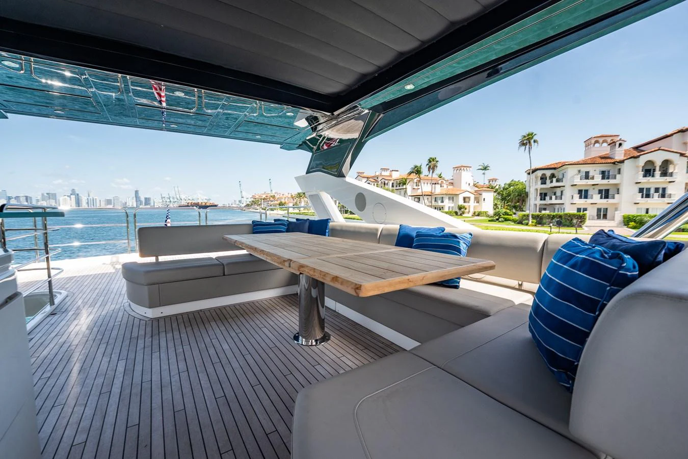 The aft deck offers a spacious and stylish seating area with a beautiful view of the surroundings. aboard BAZINGA Yacht for Sale