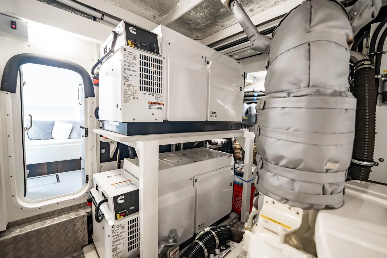 The engine room is equipped with advanced machinery and well-organized systems. aboard BAZINGA Yacht for Sale