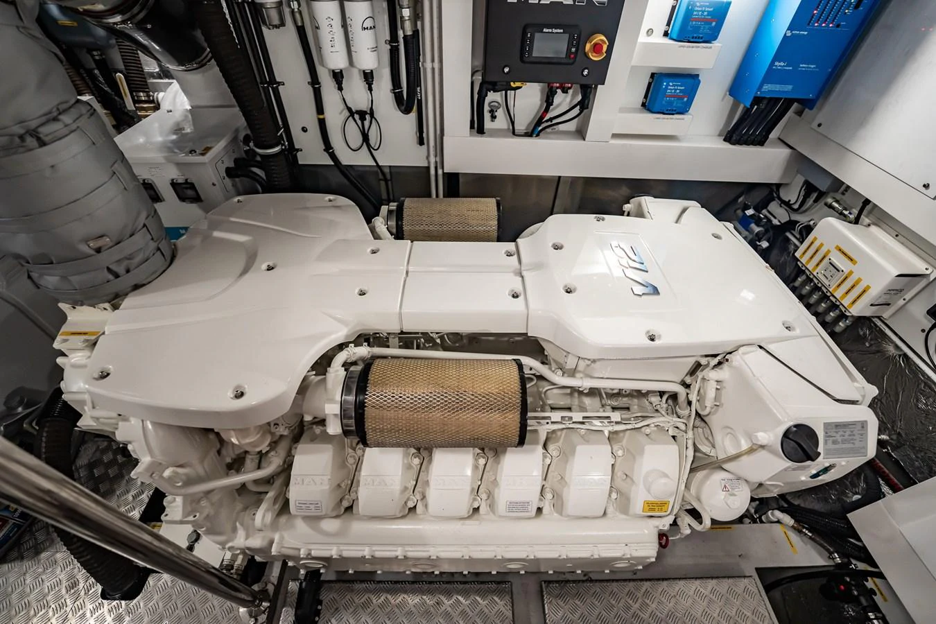 The image showcases the pristine engine room of the yacht, highlighting the advanced machinery and clean setup. aboard BAZINGA Yacht for Sale
