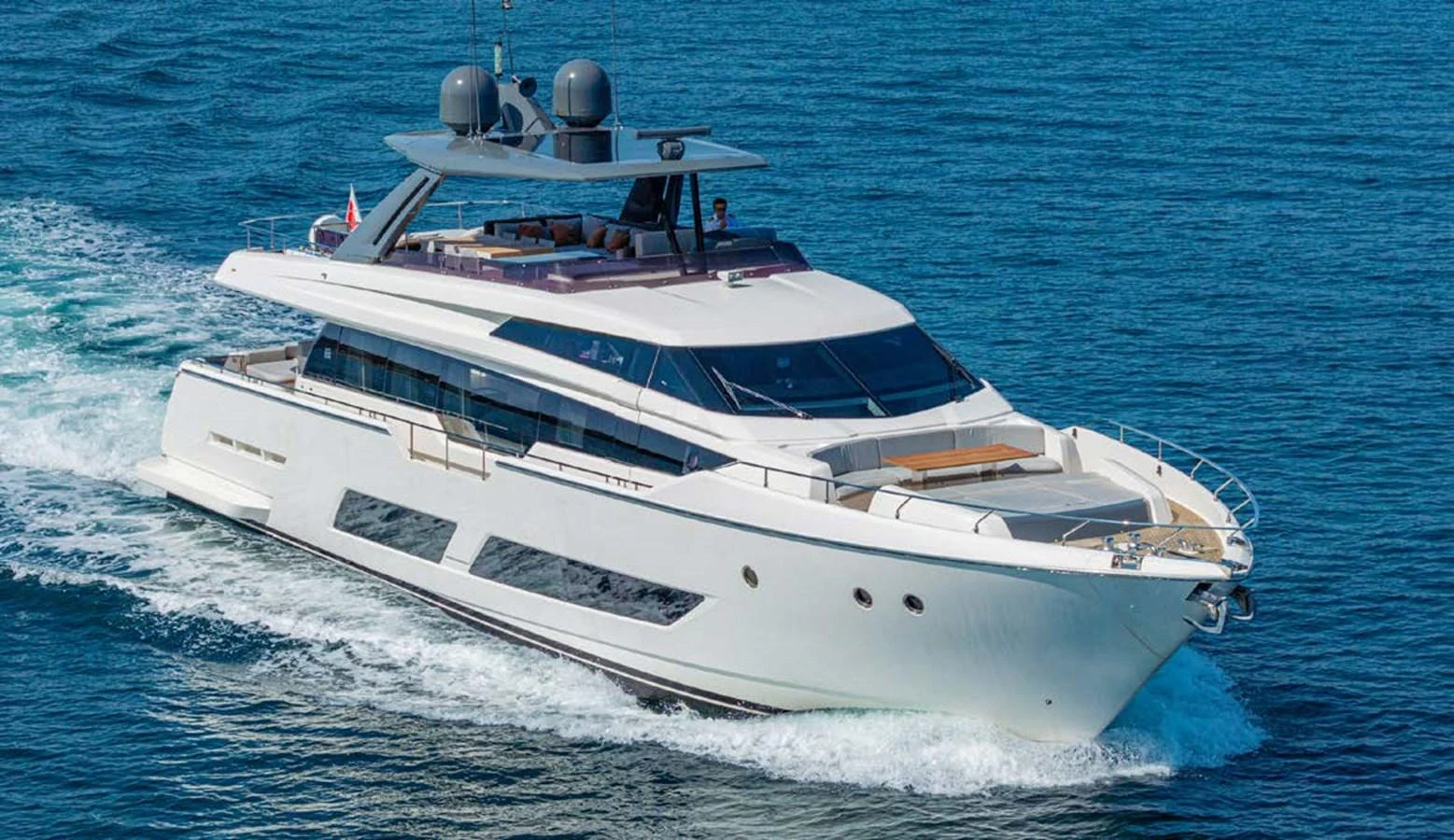 A sleek and modern yacht cruises gracefully on the open water. aboard E3 Yacht for Sale