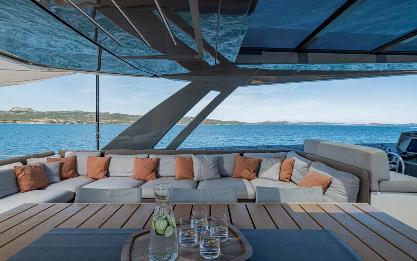 The aft deck offers a spacious seating area with a stunning ocean view, perfect for relaxation and socializing. aboard E3 Yacht for Sale