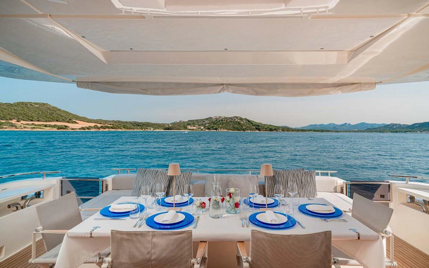 An elegant dining area on the aft deck offers stunning views of the surrounding waters. aboard E3 Yacht for Sale
