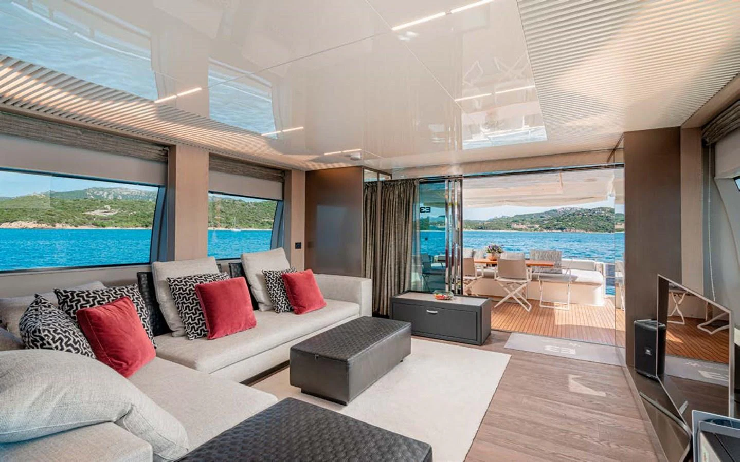 The salon offers a luxurious and spacious seating area with stunning views of the surrounding waters. aboard E3 Yacht for Sale