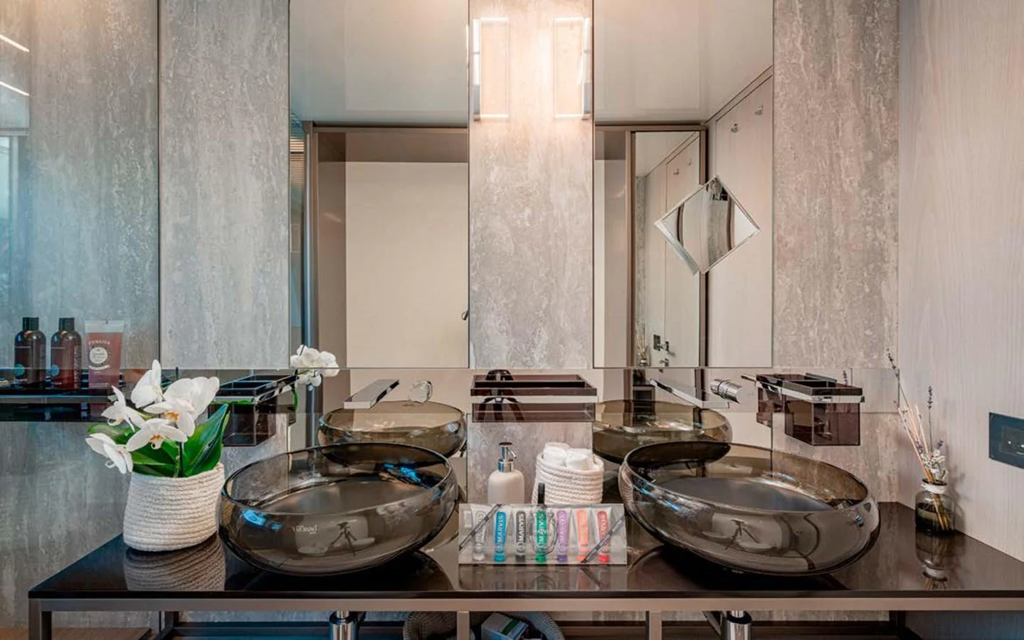 The yacht's bathroom features elegant dual sinks and modern fixtures. aboard E3 Yacht for Sale