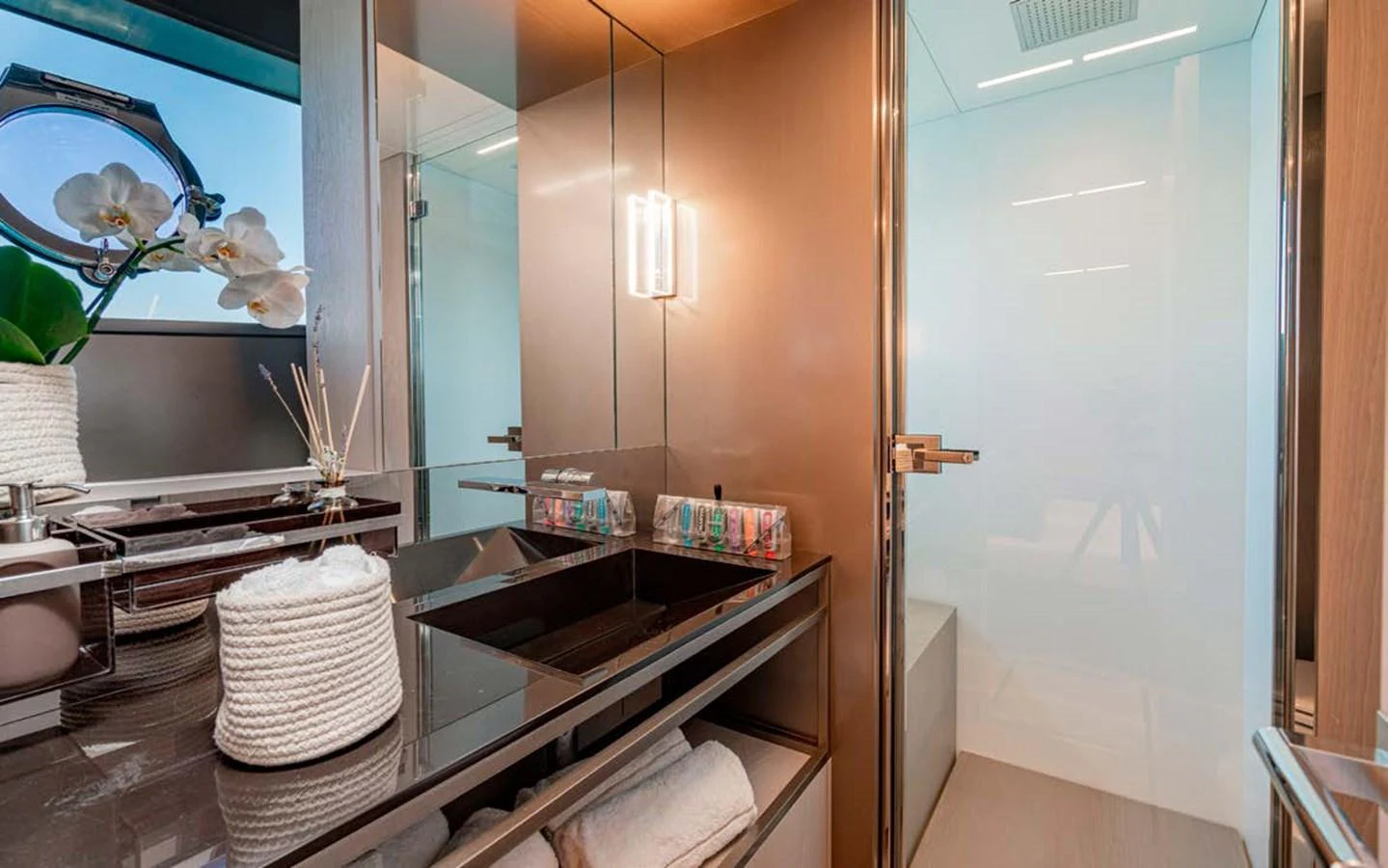 A modern bathroom with sleek fixtures and elegant design. aboard E3 Yacht for Sale