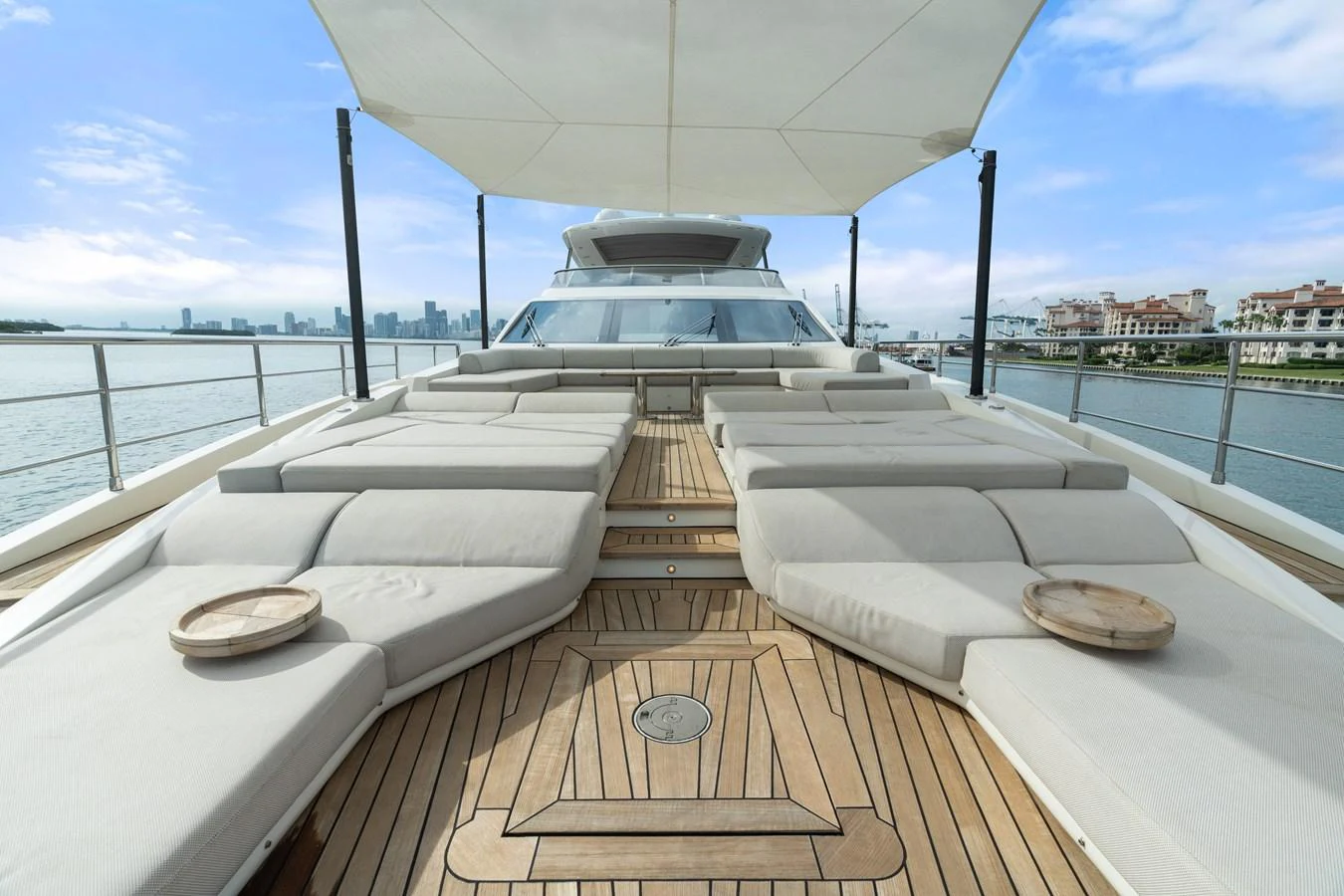 The sundeck offers luxurious lounging with ample seating and stunning views. aboard AZIMUT GRANDE 32/23 Yacht for Sale